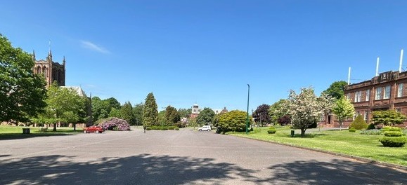 Car Park with church on the left and Easterbrook Hall on the right